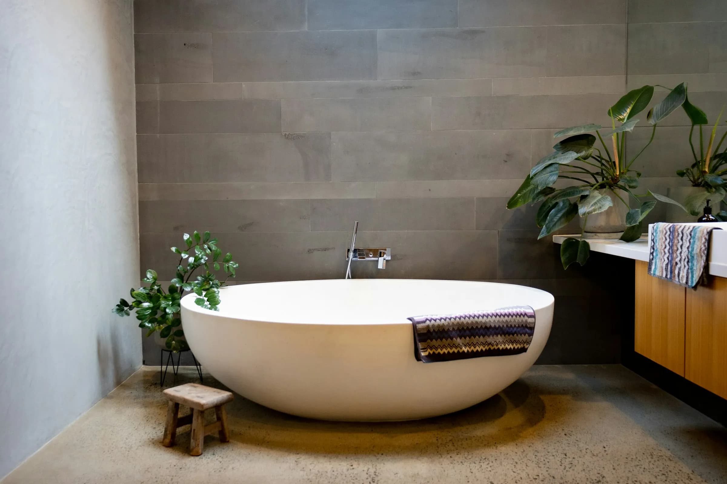 A stone-tiled bathroom