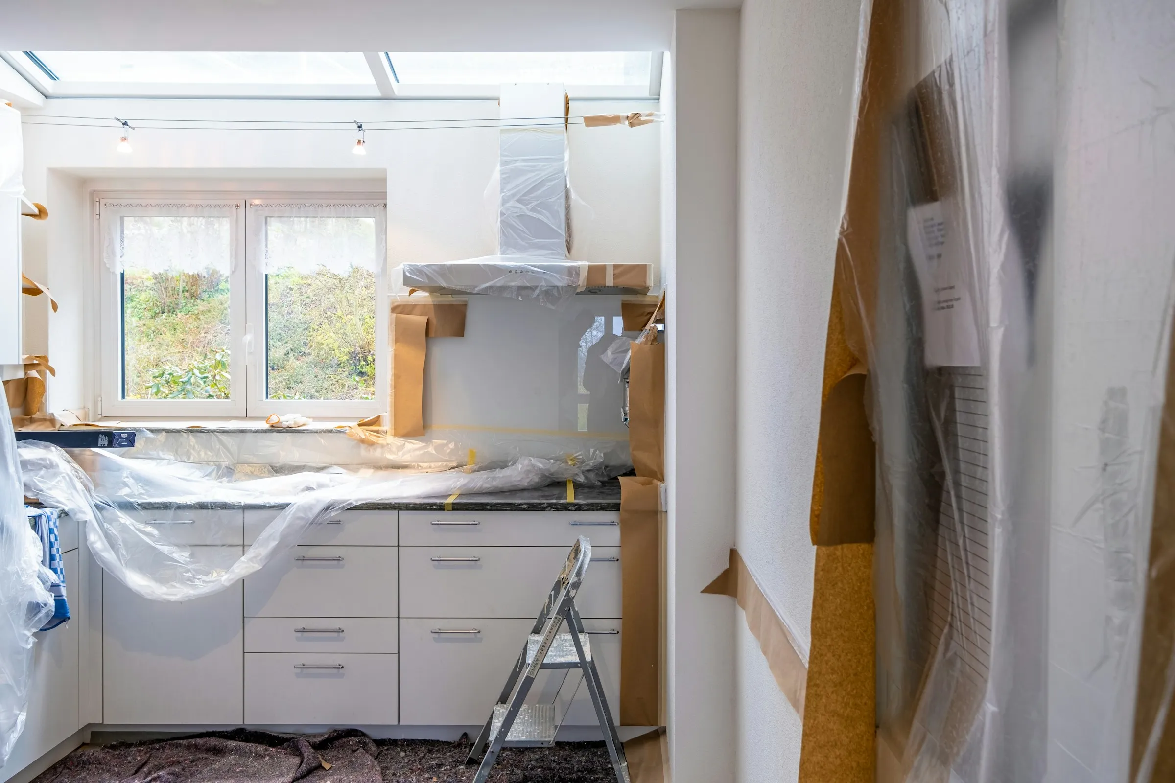 A remodeled kitchen with new cabinets